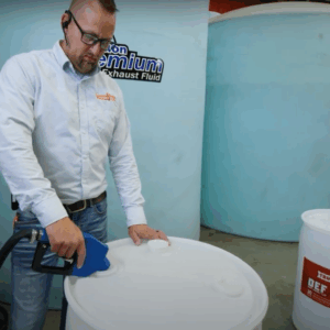 ToughAg rep filling barrel with Diesel Exhaust Fluid DEF